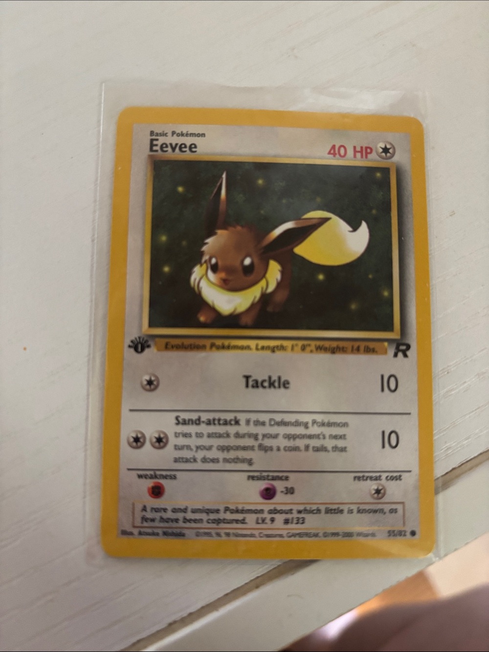Team Rockets Eevee Pokemon card